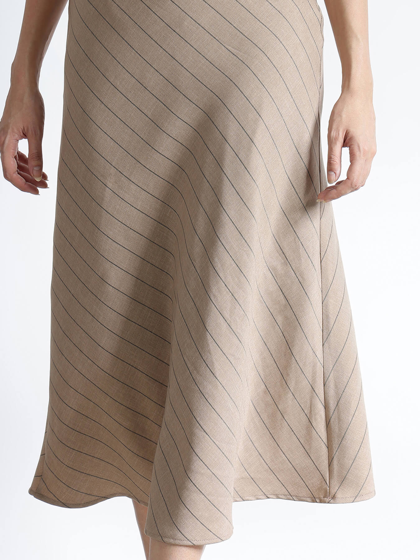 Beige dress with striped pattern on a white background